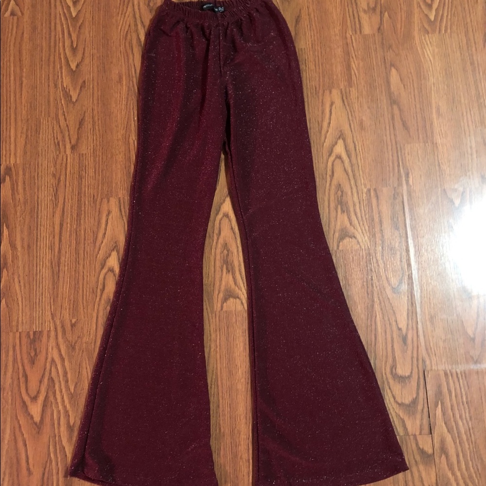 Burgundy glitter flared leg pants